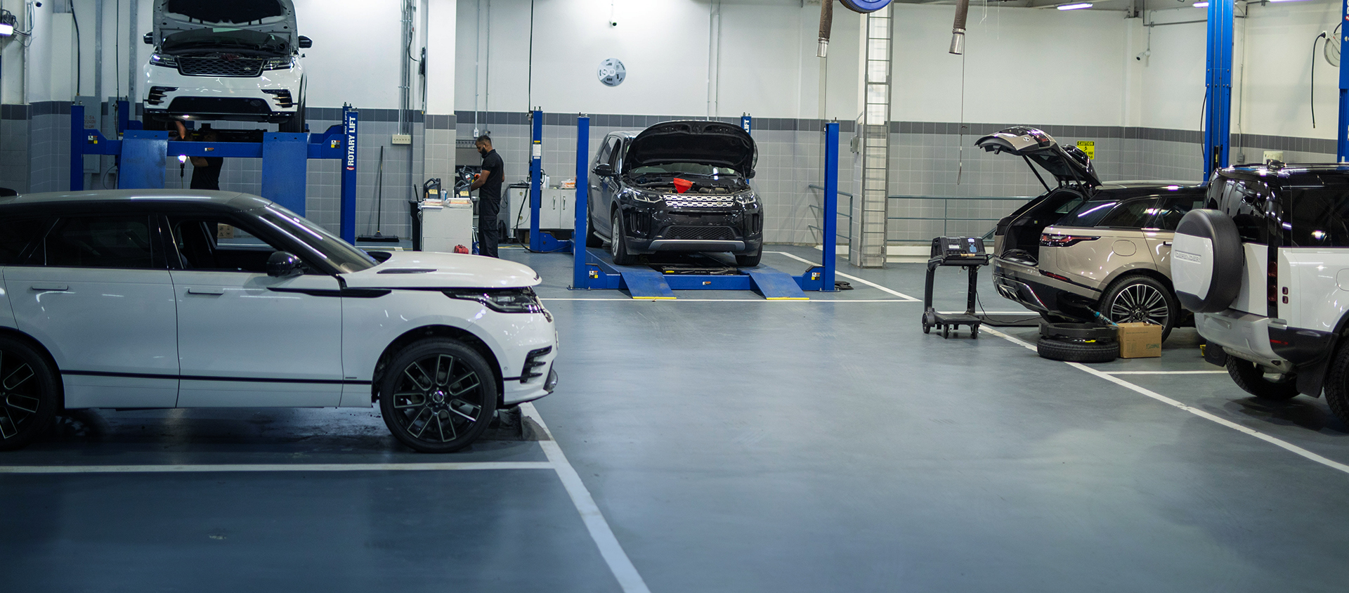 ANSA Motors service advisor assisting customer